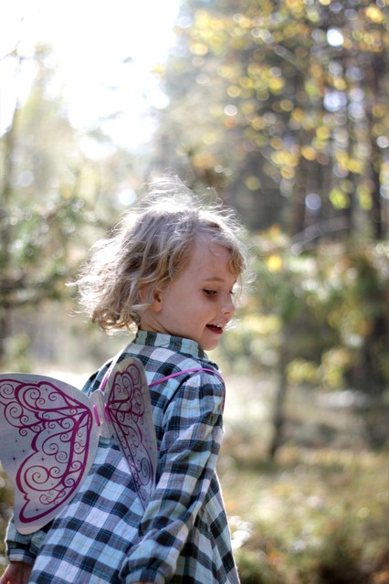 pretty little angel angel girl playing outside ambrozinio .